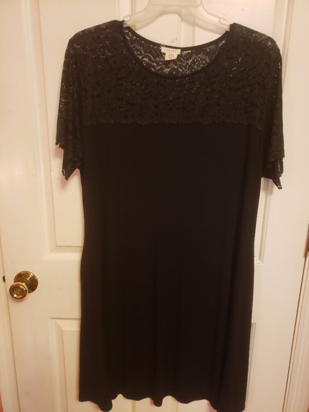 This is a Black  YELETE Dress.
